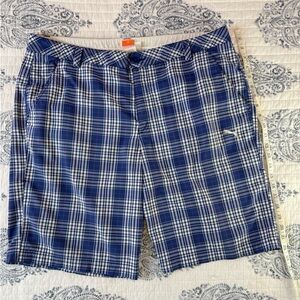 Puma men's golf shorts in blue plaid‎ performance fabric.